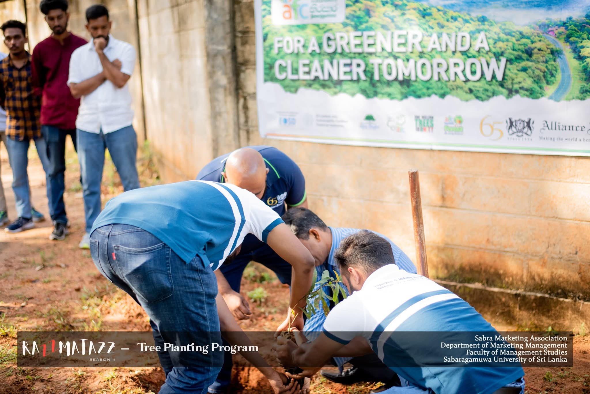 Planting Hope for a Greener Tomorrow | Razzmatazz Season II  In a heartfelt gesture towards a sustainable future, we proudly planted trees at the Faculty of Management Studies on March 4th, 2025. Marking a memorable moment of Razzmatazz Season II  This meaningful initiative was made possible in collaboration with our esteemed Platinum Sponsor, Alliance Finance Company. Together, we sowed the seeds of hope, growth, and responsibility.  Swipe through to witness how we turned commitment into action, one tree a